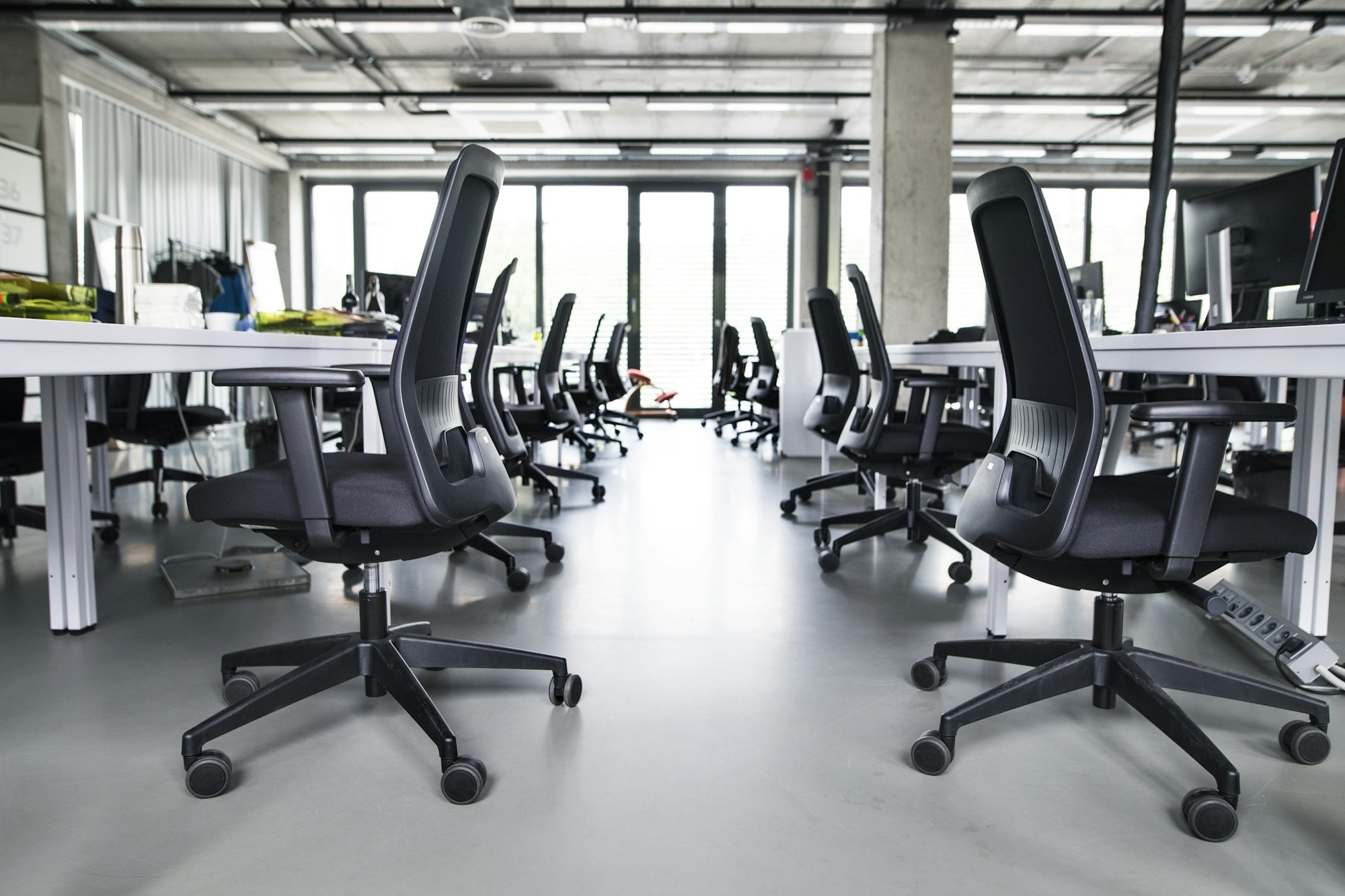 The interior of big empty modern office after work.